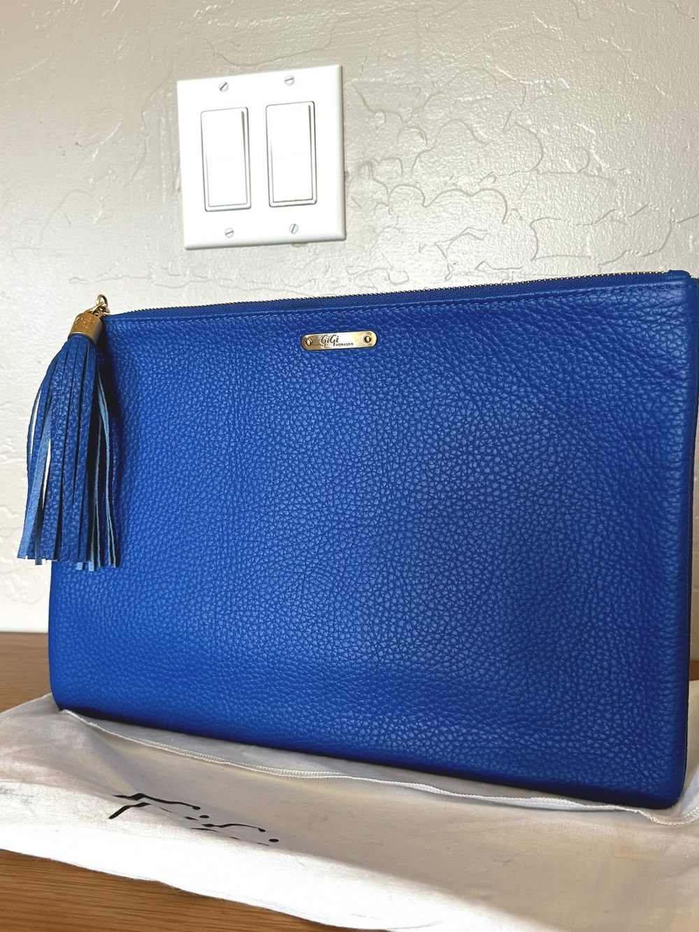 Gigi New York blue pebble leather Uber clutch